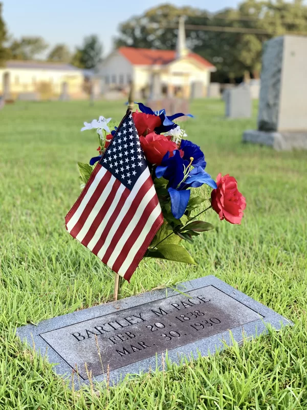 Luke & Shawn Dennis ensure American flags are placed at each Serviceman's grave.