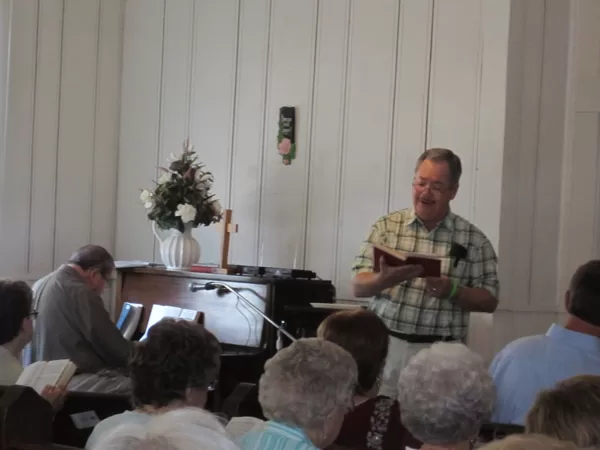Mike Briley leading singing