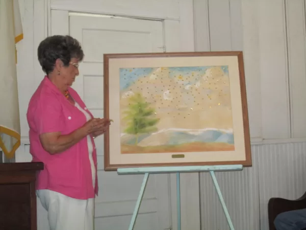 Jo Ann Agee adds stars in memory of those recognized